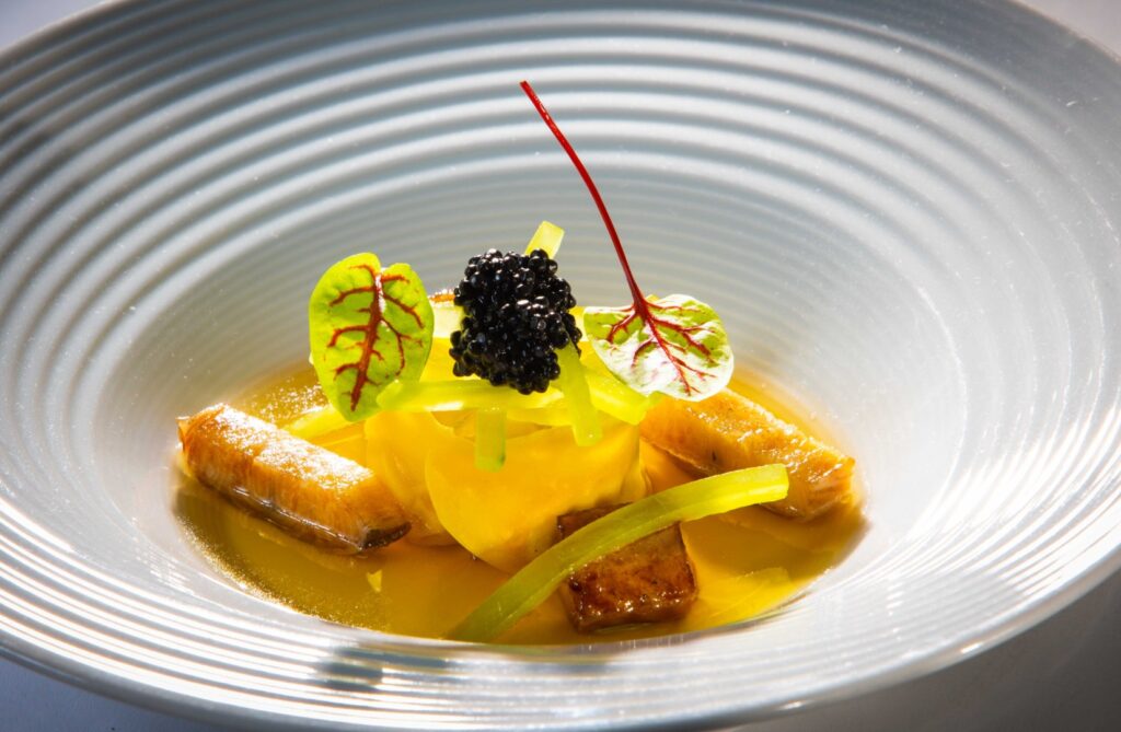 Tortellini of Lincolnshire eel saffron and lemon grass consomme and Oscietra caviar